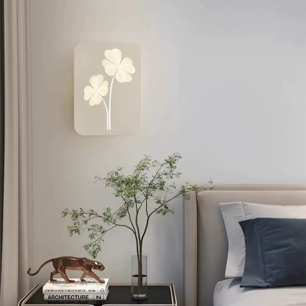 Modern wall lamp with acrylic decorative shade showing tricolour LED lighting and iron construction