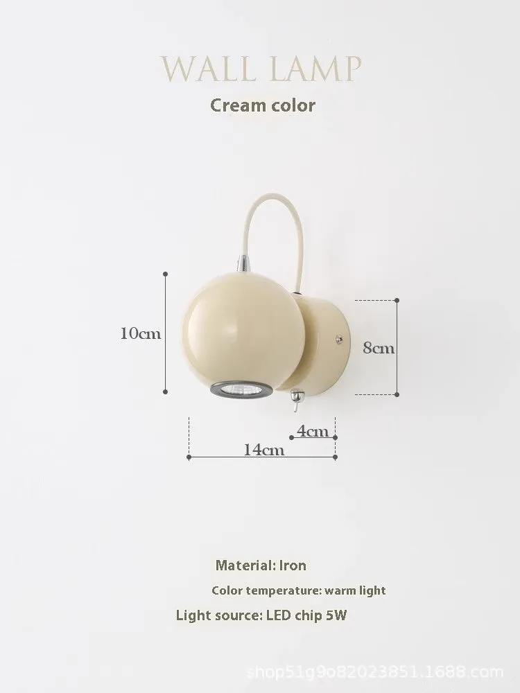 Cream Nordic style bedside wall lamp with magnetic suction base showing 5W warm light