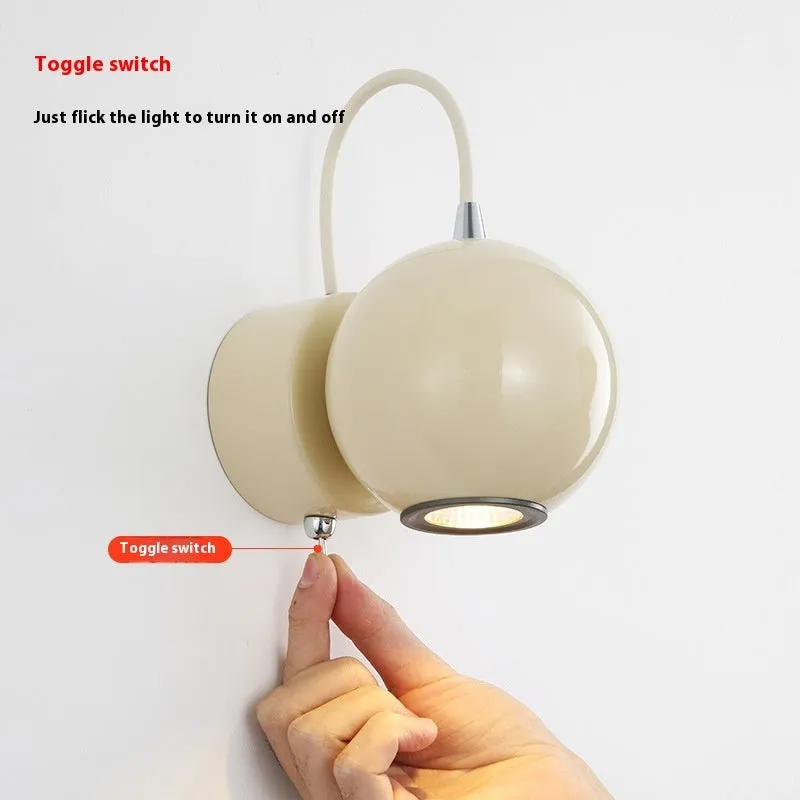 Cream Nordic style bedside wall lamp with magnetic suction base showing 5W warm light