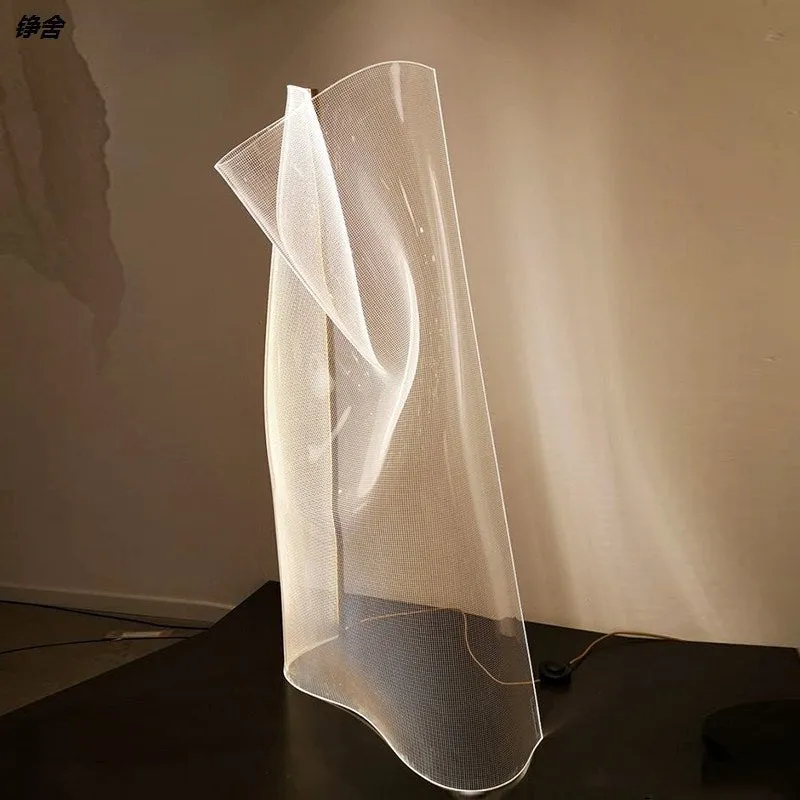 Irregular artistic acrylic ribbon table lamp in living room setting