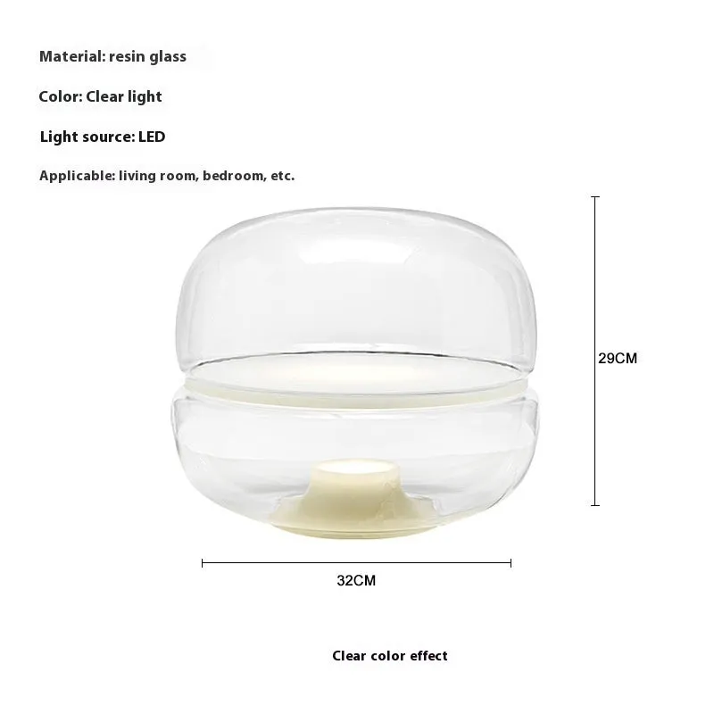 Nordic modern creative table lamp with warm light on a desk