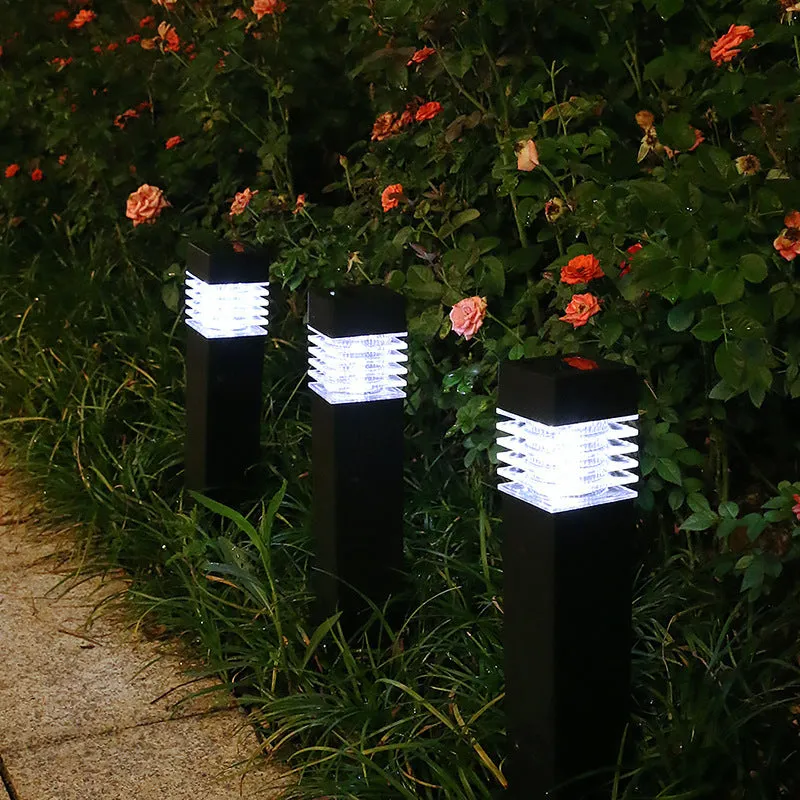 White cuboid solar-powered ground stake light for garden pathways