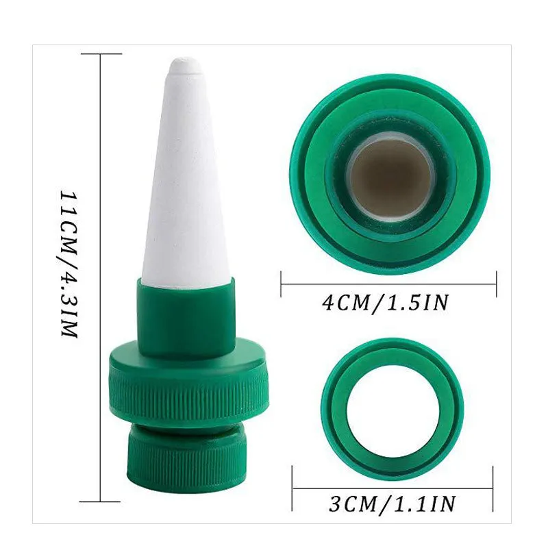 Green ceramic automatic water dripper for plant irrigation attached to a bottle.