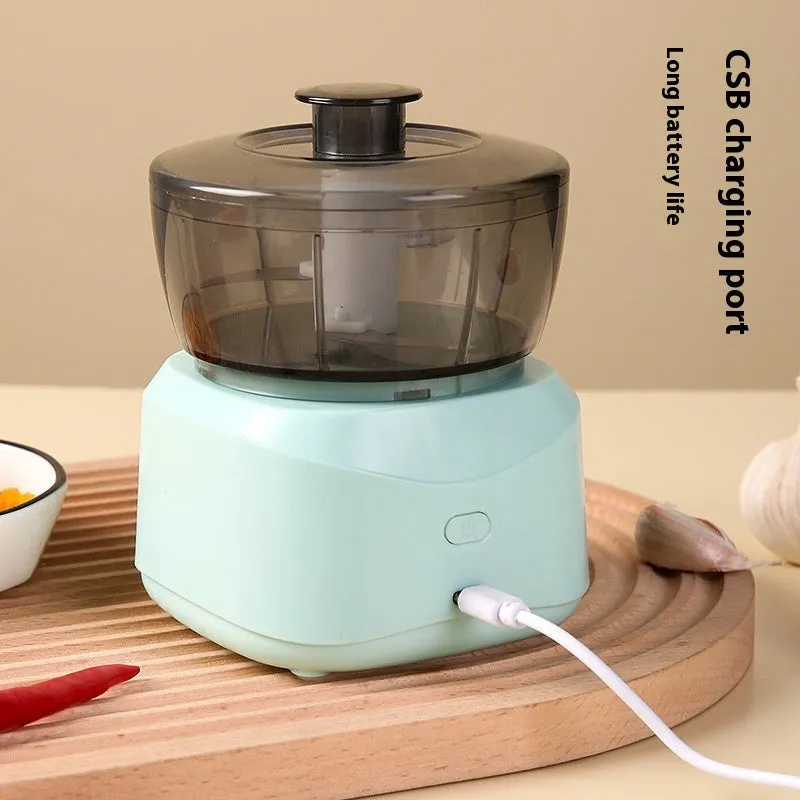 Light blue compact wireless food processor with bowl and blade, 1L capacity, quiet motor