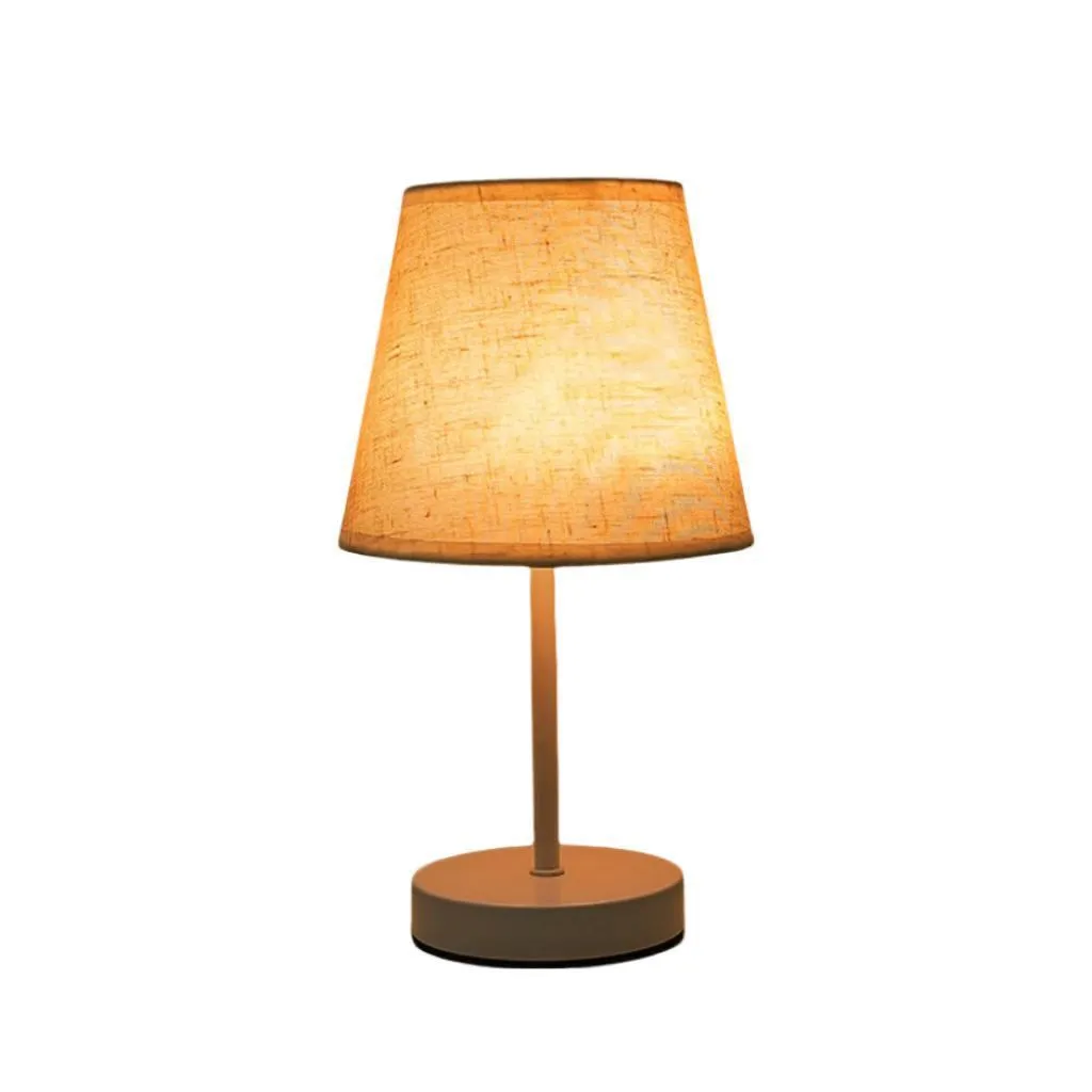 Solid wood fabric bedside lamp with rechargeable touch dimming and three colour light options on a nightstand