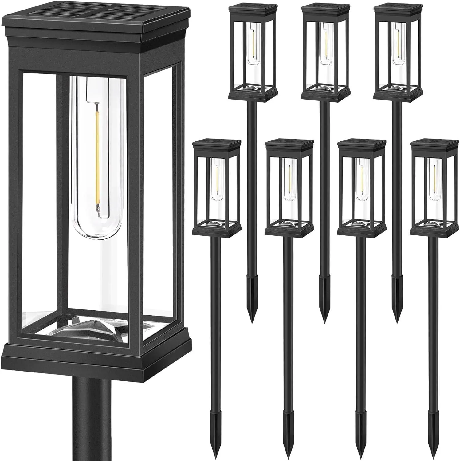 Round tungsten wire solar lawn lamp on grass in a garden courtyard emitting warm light