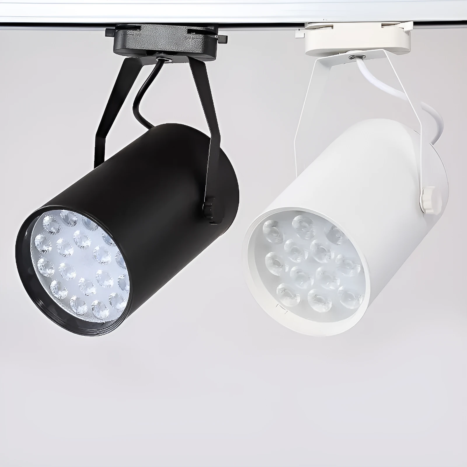 LED track spotlight with black aluminium shell mounted on lighting track