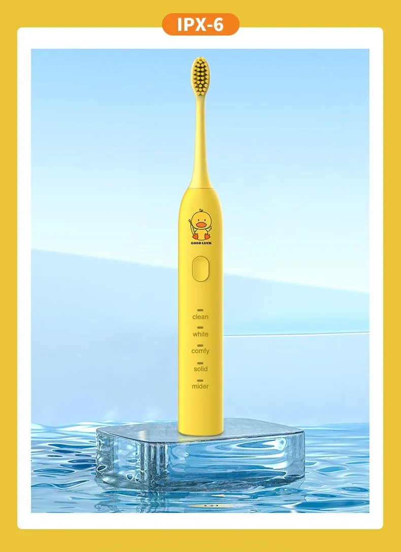 Yellow USB rechargeable adult electric toothbrush with small duck design and soft bristles.