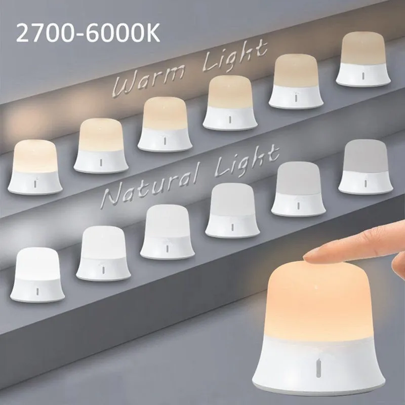 White bedside nursing night light with touch controls for dimming and colour selection.