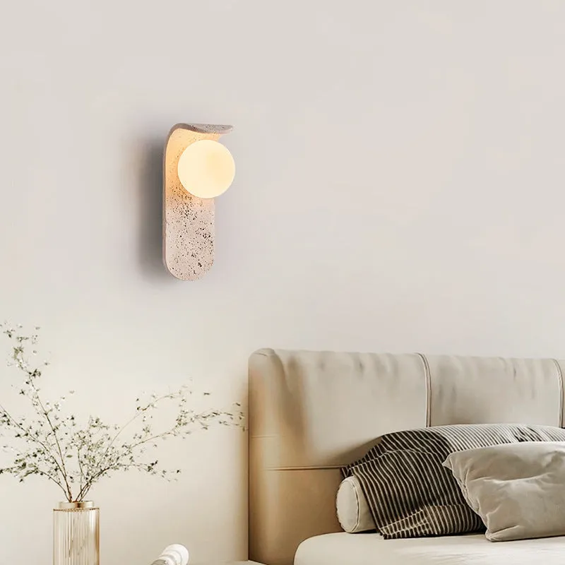 Cream cave stone bedside wall lamp with warm light bulb, 9cm wide and 25cm tall, wall-mounted