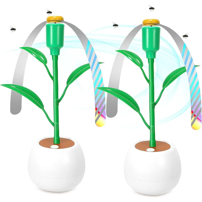 White battery fly repellent fan with curved hose and fruit-shaped design on outdoor table