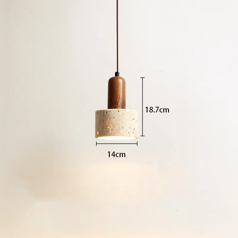 Yellow cave stone wabi sabi style marble bedside pendant light on a wooden surface