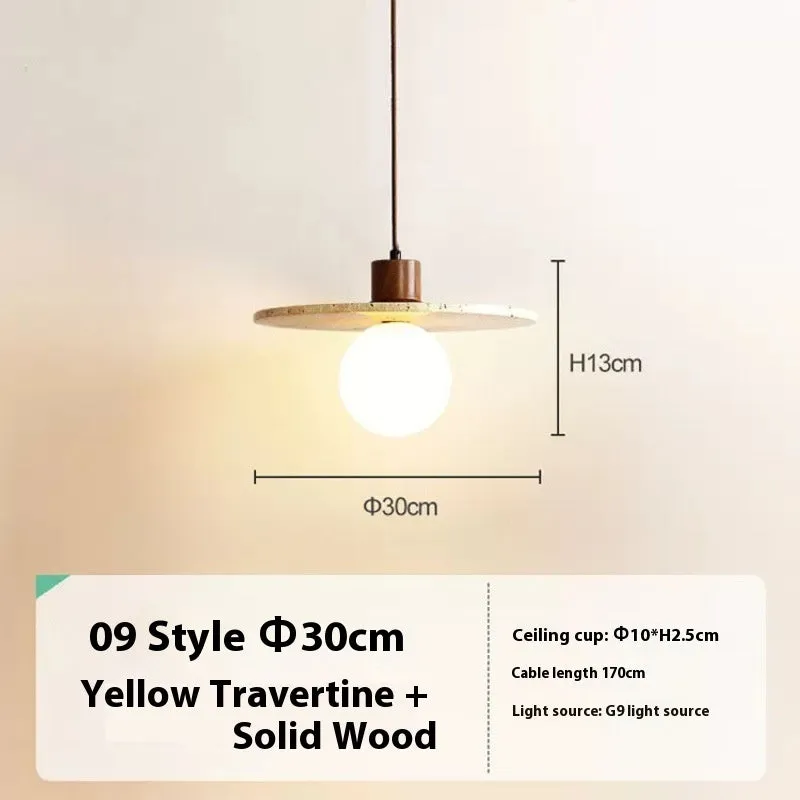 Yellow cave stone wabi sabi style marble bedside pendant light on a wooden surface
