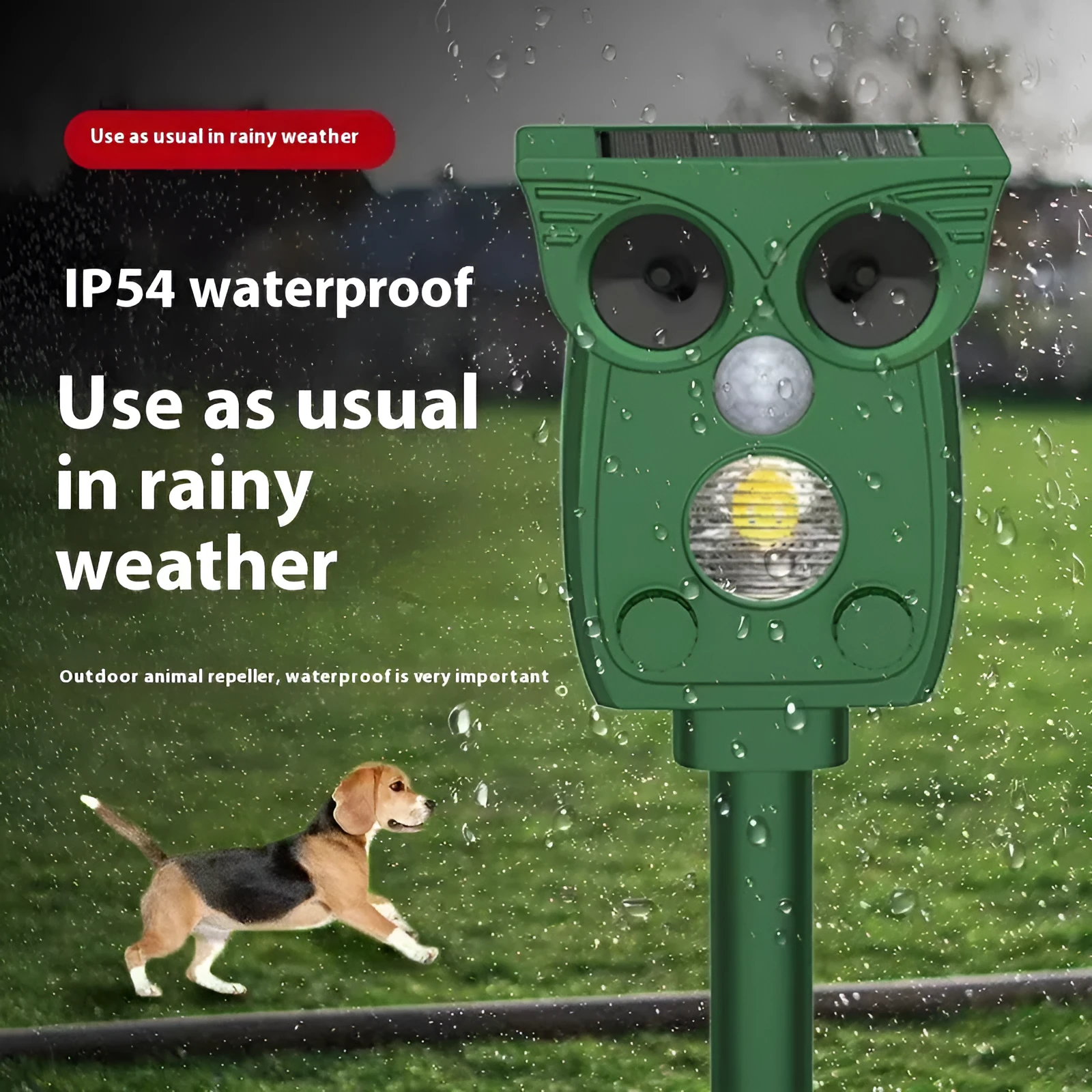 Dark green solar-powered infrared animal repeller with plastic body on grass