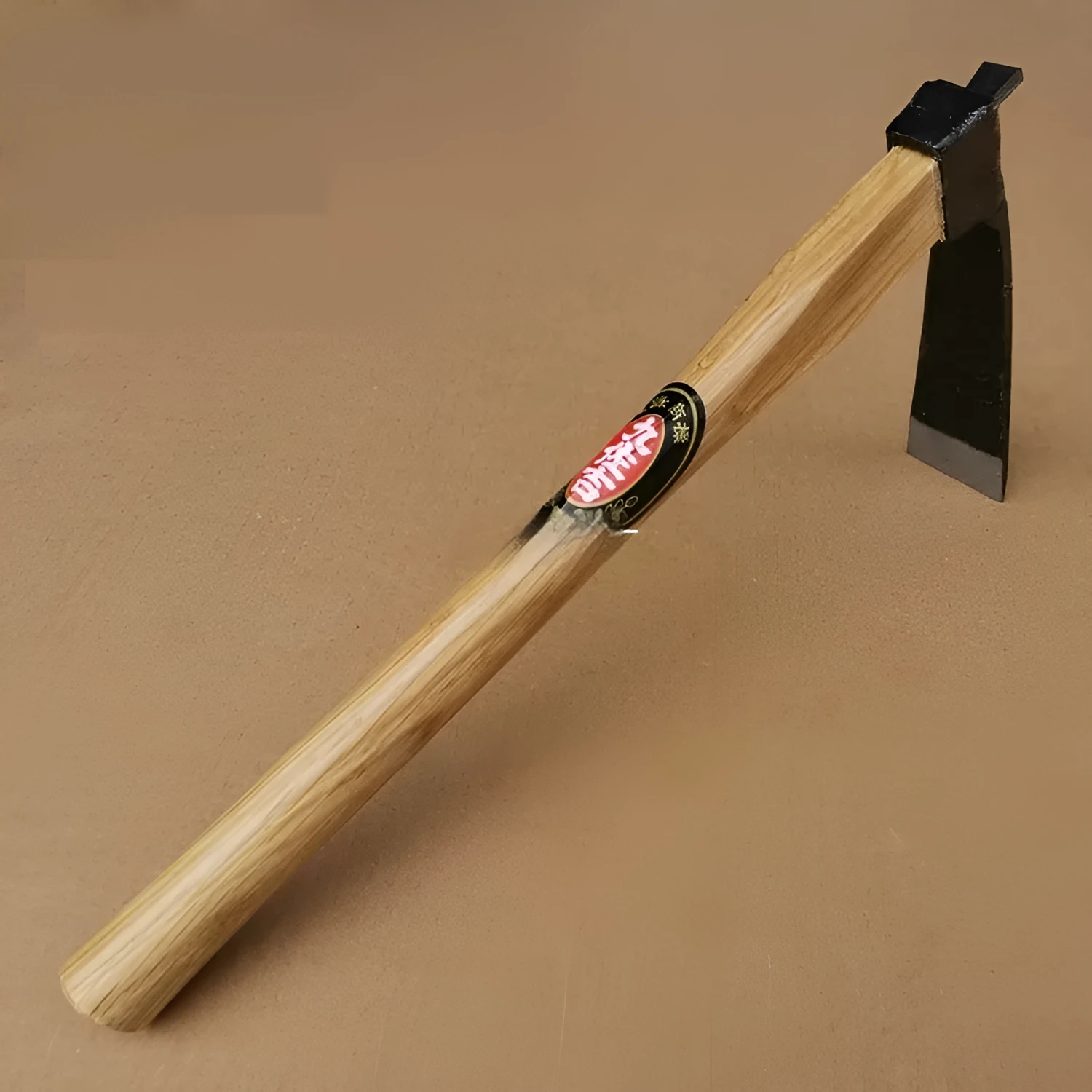 Forging No 7 small hoe with carbon steel head and brown Qinggang wood handle on white background