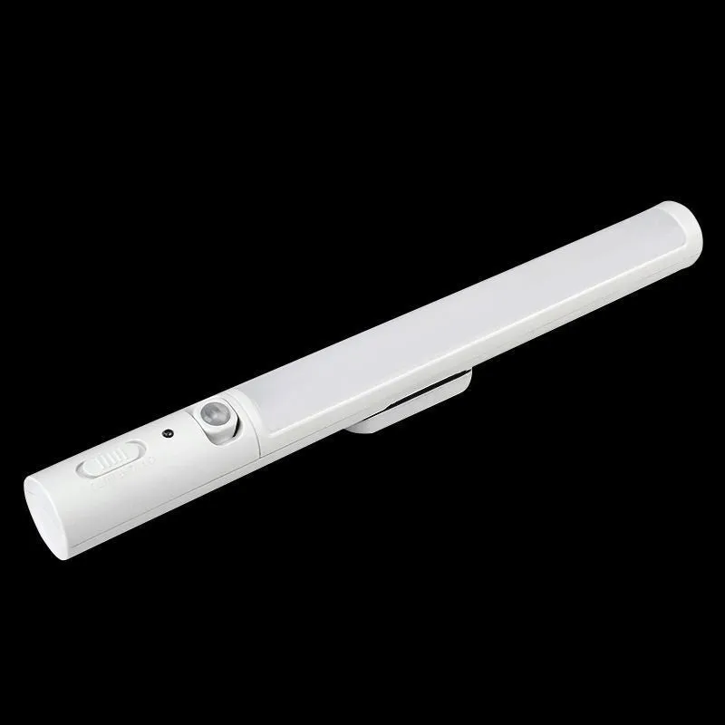 Slim white human body induction LED wall light with magnet back for under-cabinet or wardrobe installation.