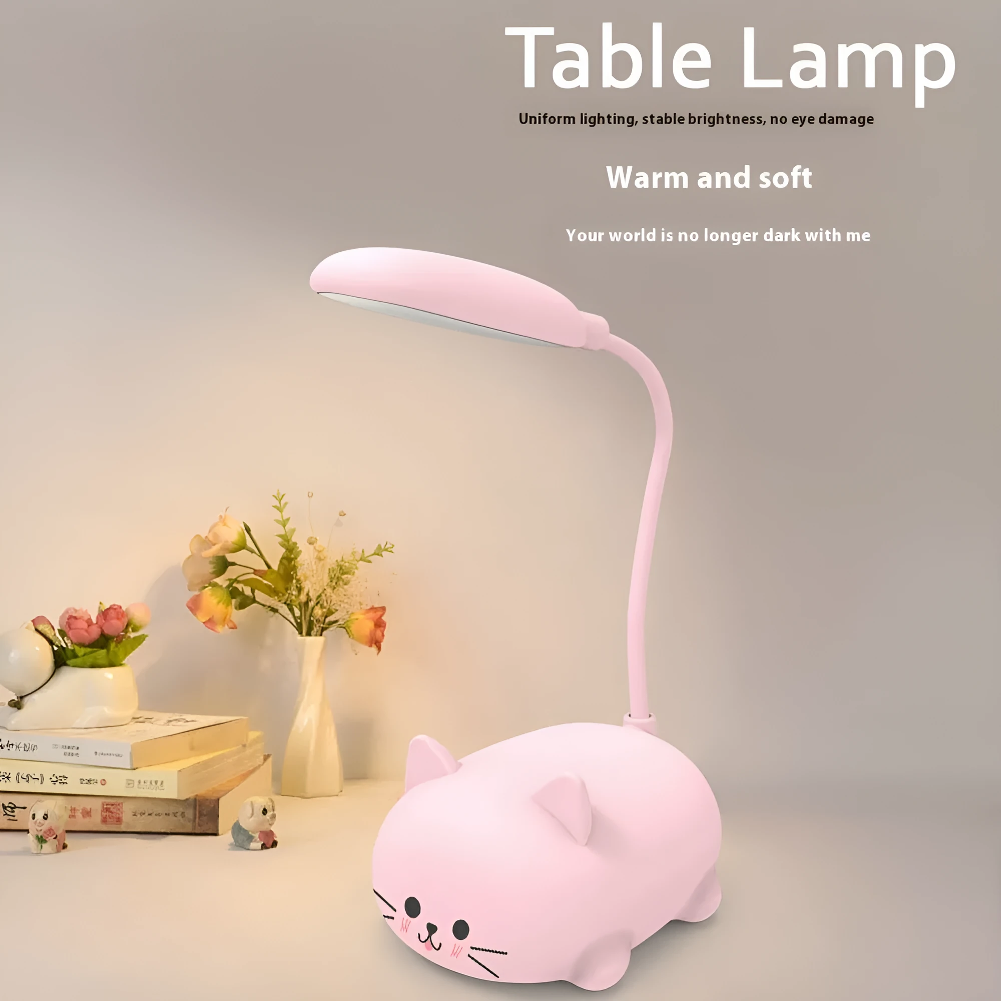 LED cartoon cat desk lamp in pink with USB rechargeable battery and ABS body on a desk