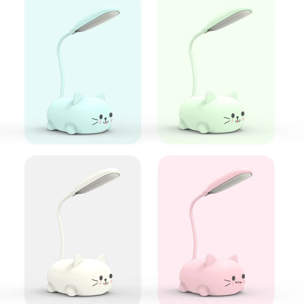 LED cartoon cat desk lamp in pink with USB rechargeable battery and ABS body on a desk