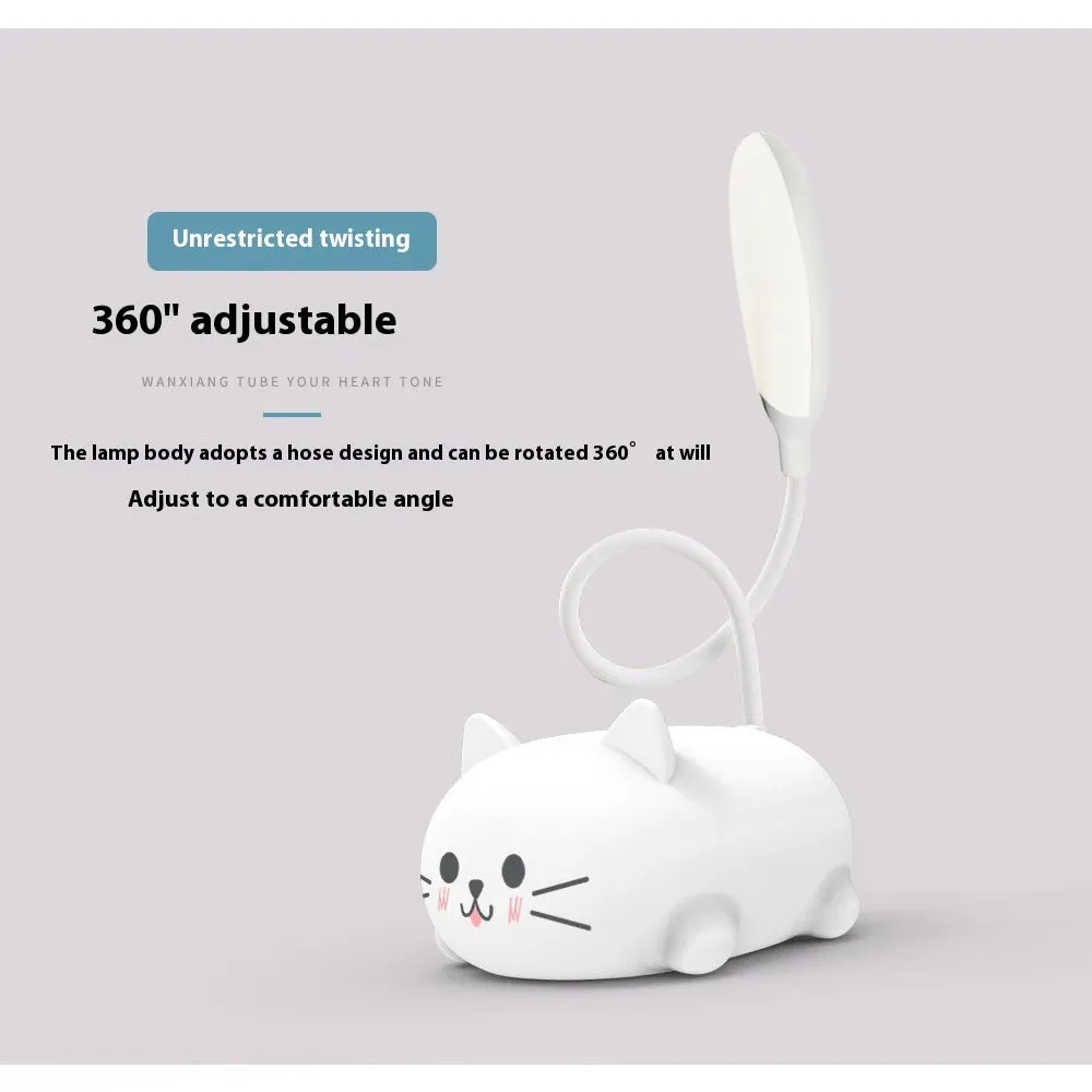 LED cartoon cat desk lamp in pink with USB rechargeable battery and ABS body on a desk