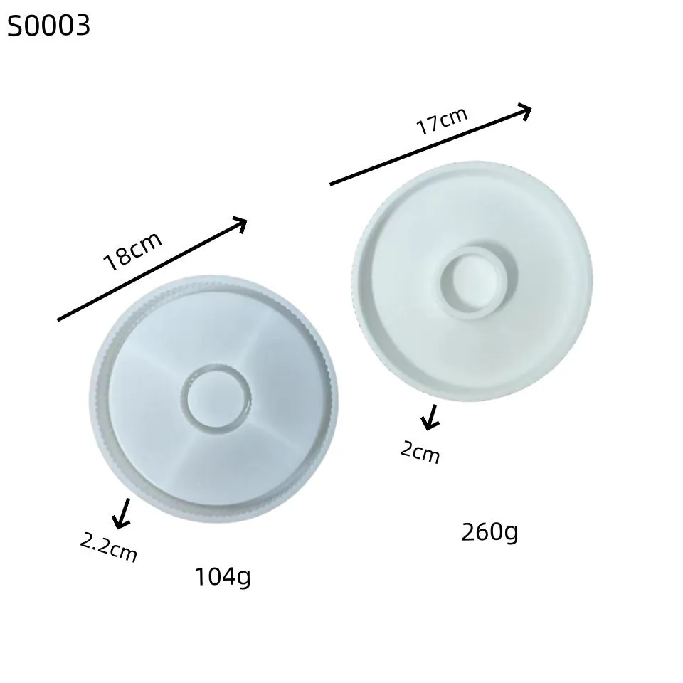 Set of five silicone moulds for tray decoration and candlestick making, including long candle holder, round base, and pacifier shapes, on a neutral background.
