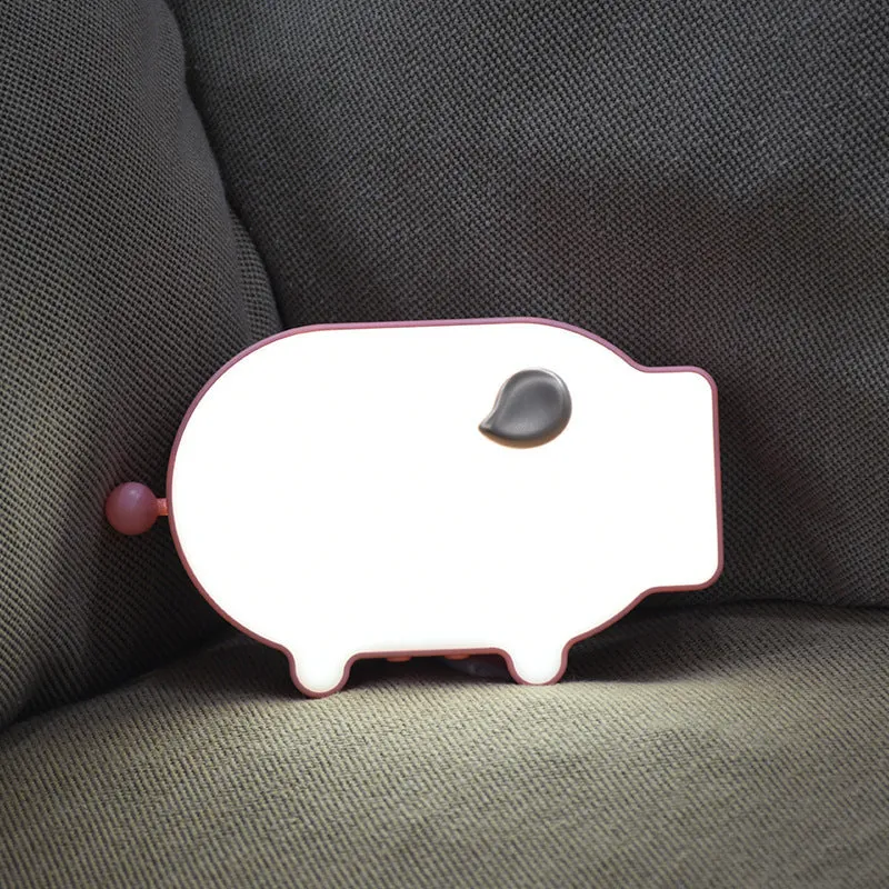 Blue multifunctional LED alarm clock showing time and temperature on display, with USB charging port.