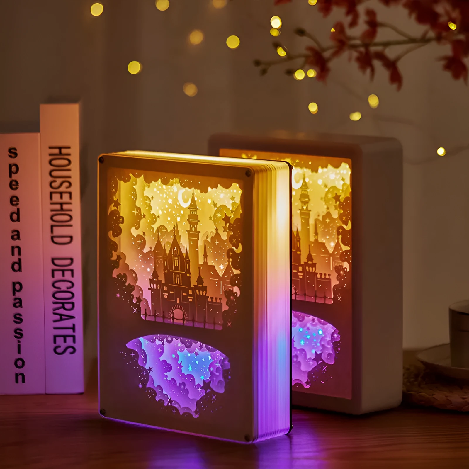 Modern white USB bedside night light with a carved plastic shade, sitting on a wooden table next to its remote control.