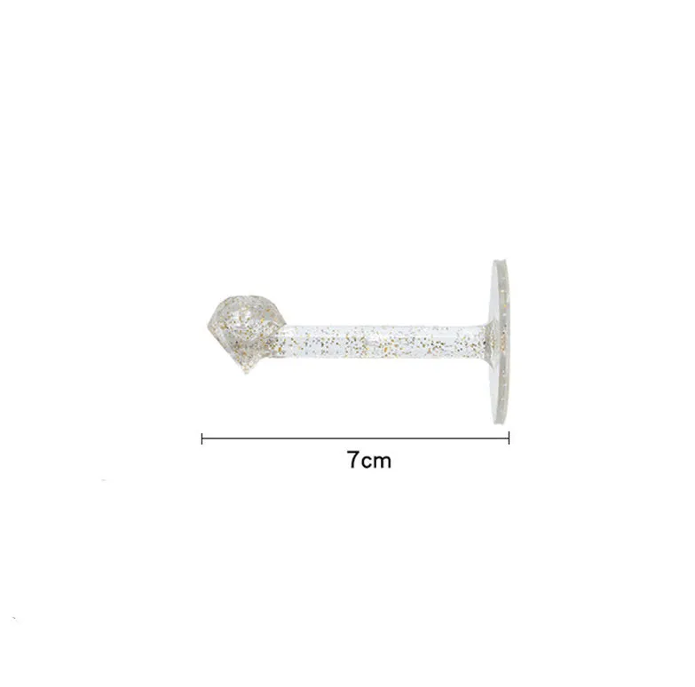 White plastic diamond crystal storage hook on a wall, large size 13x7x4cm