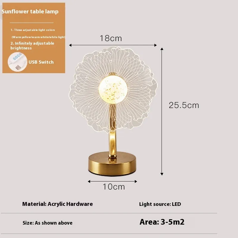Creative acrylic table lamp with three-colour USB dimming, sunflower shape, on a desk