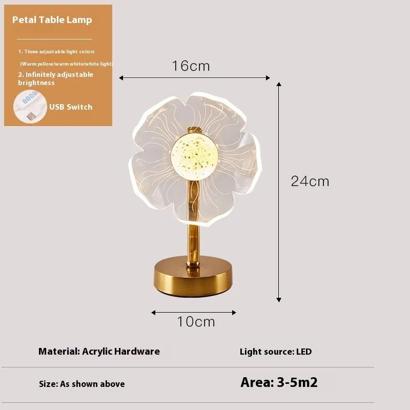 Creative acrylic table lamp with three-colour USB dimming, sunflower shape, on a desk