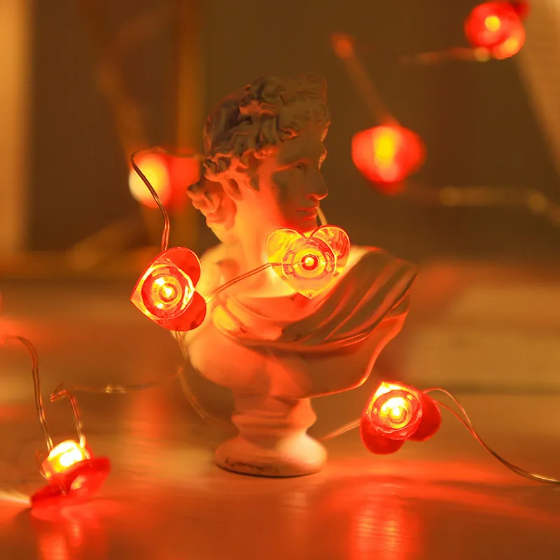 Heart-shaped LED copper wire string lights for Valentine's Day trunk proposal display