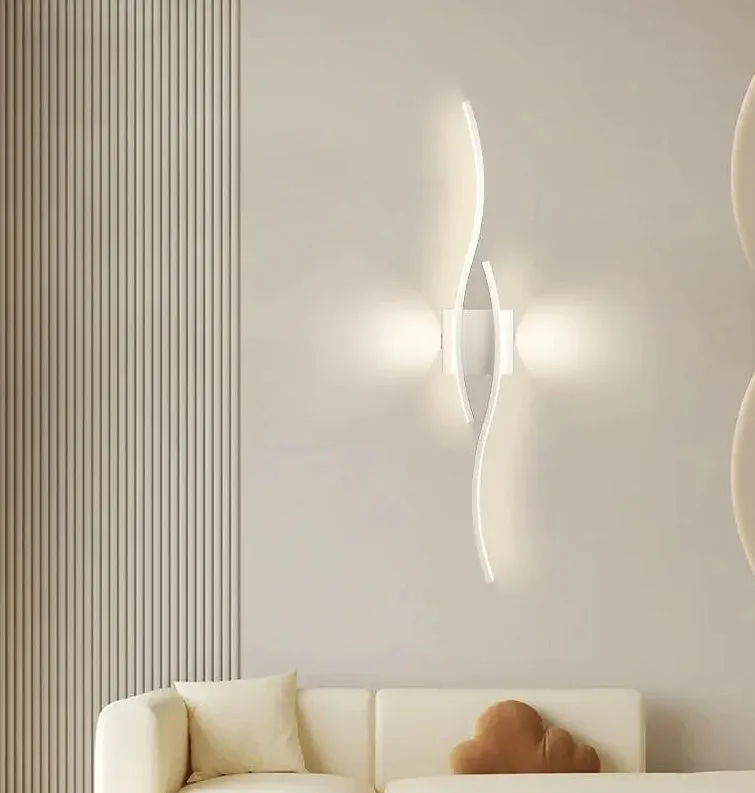 Black 60cm bedside wall lamp with acrylic panel and wrought iron frame on neutral wall