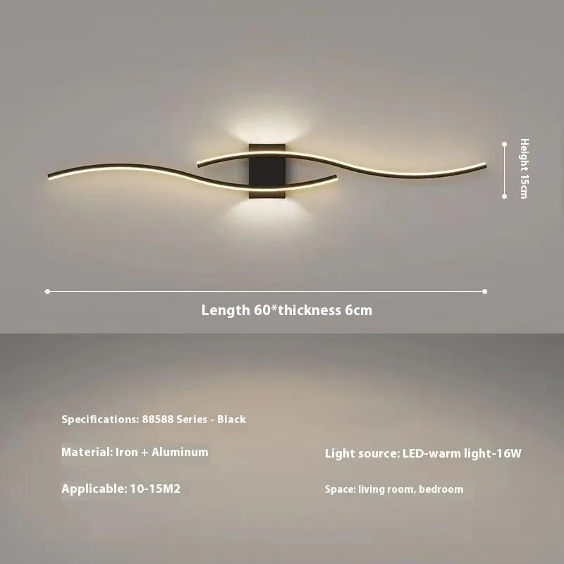 Black 60cm bedside wall lamp with acrylic panel and wrought iron frame on neutral wall