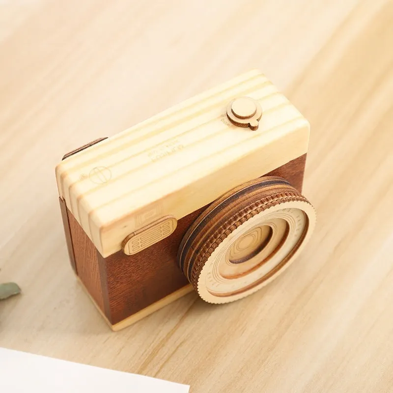 Pine wood rotating music box with sanding mechanism in miniature carton packaging