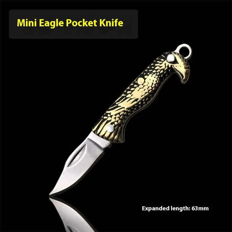Brass mini folding knife keychain pendant with 3cm blade and 42mm shank on a key ring