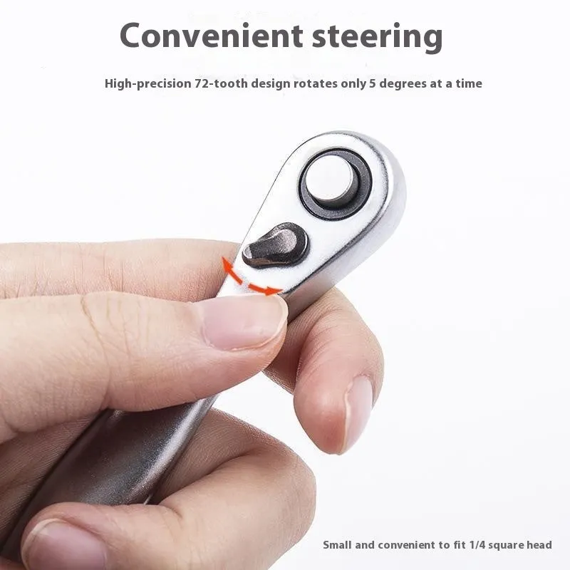 Silver galvanised steel mini ratchet wrench socket wrench on neutral background
