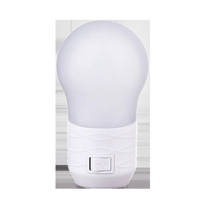 Plug-in bedside baby night light with round design in white, blue or pink shell colours