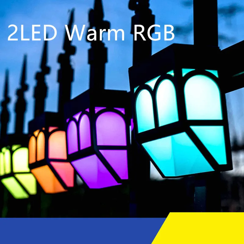Square white solar wall lamp mounted on outdoor fence with LED illumination
