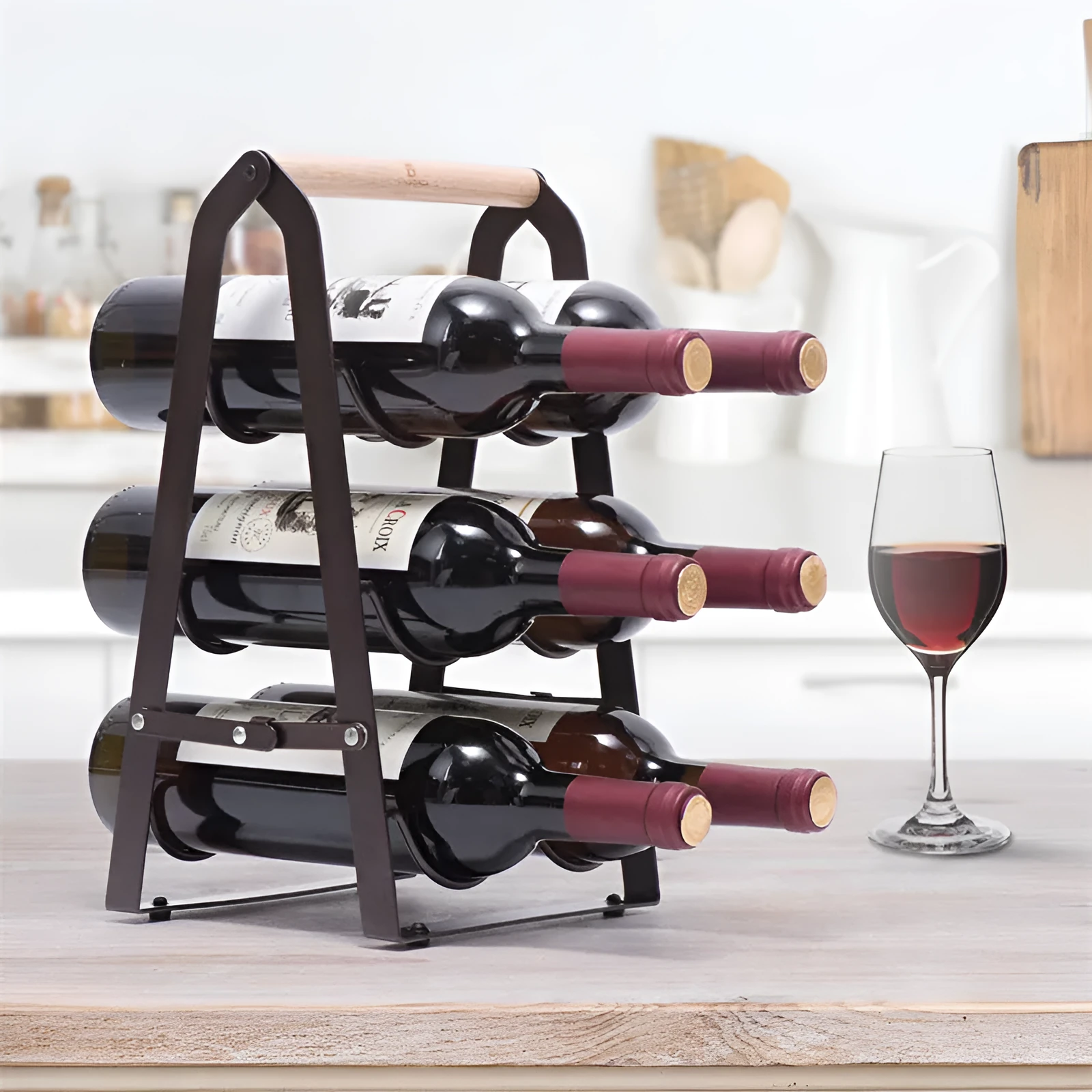 Iron desktop wine rack black with two wine bottles on kitchen countertop