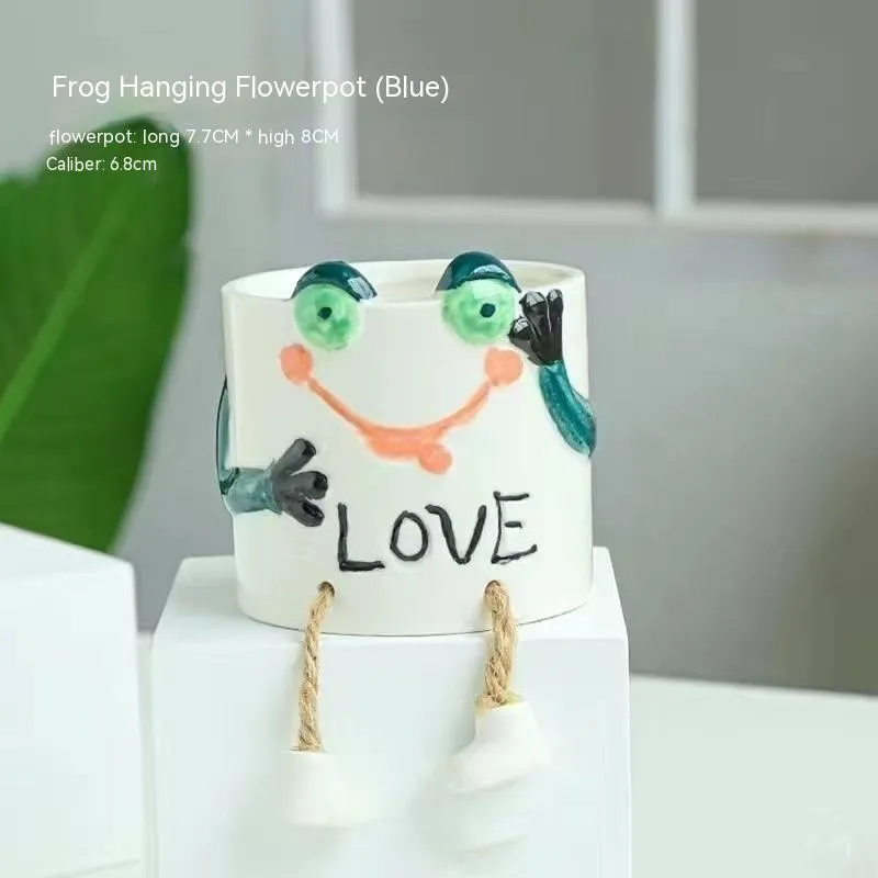 Ceramic hanging foot flowerpot with cartoon design for succulent plants on desktop