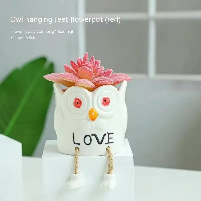 Ceramic hanging foot flowerpot with cartoon design for succulent plants on desktop