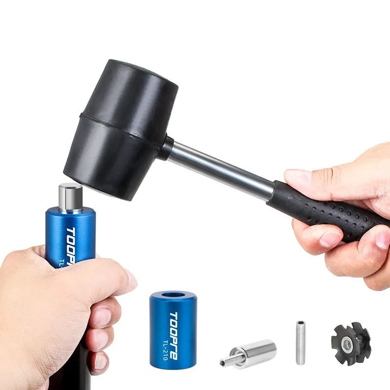 Blue sunflower driving tool for bicycle bowl group hanging core installation, made from aluminium alloy and stainless steel, on a workbench.