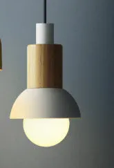 Nordic 3W LED night light in warm glow on a bedside table