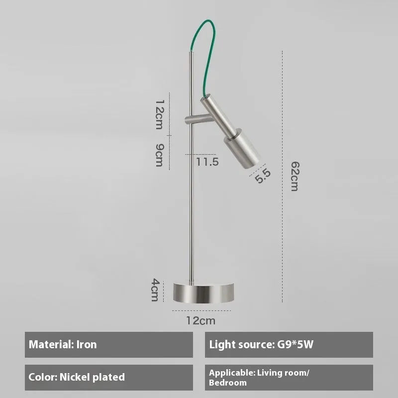 Simple modern rotating table lamp in sand black finish with wrought iron base and G9 bulb, suitable for bedside use
