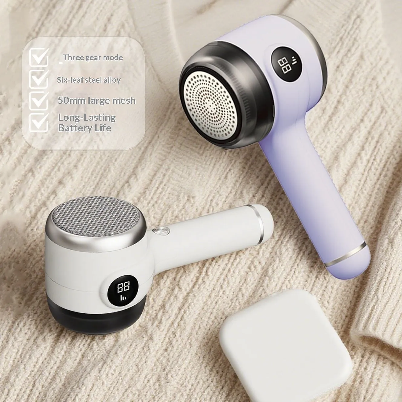 Rechargeable fur ball trimmer for fabric care in white with charging cable