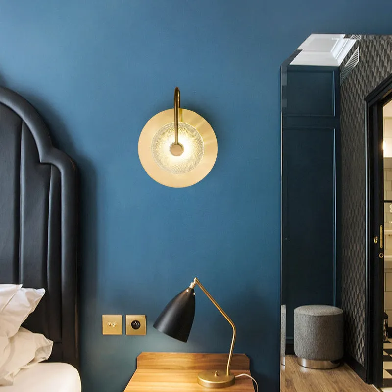 Modern simplicity wall lamp with clear glass shade on wall in living room background