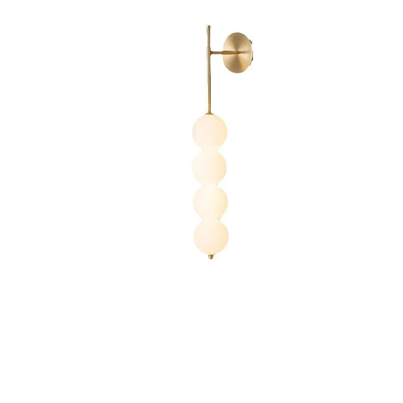 Nordic wall lamp in gold finish with tricolour light, rotomoulded construction for bedside atmosphere