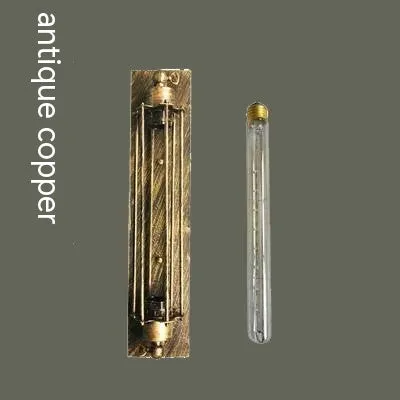 Industrial retro iron wall lamp in a vertical flute design, shown in a choice of metallic finishes.