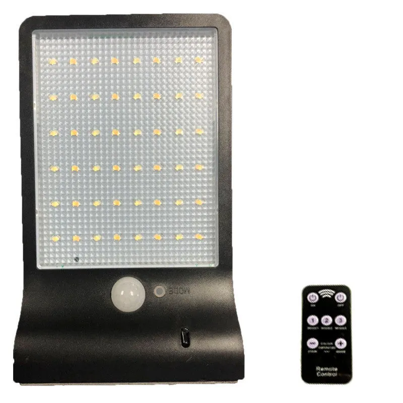 Black and white waterproof solar-powered LED garden light for outdoor use.