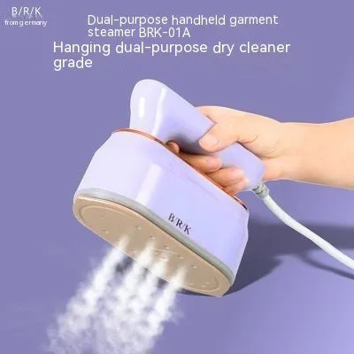 Milky white foldable portable steam iron with ceramic soleplate and international plug adaptors.