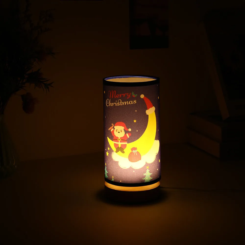 Moon-shaped Santa Claus LED night light with USB plug and bamboo base.